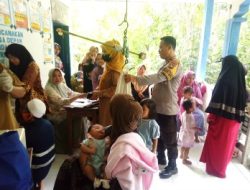 Turunkan Angka Stunting Di Majene, Bhabinkamtibmas Polres Majene Aipda Muchlis Nur Lakukan Pendampingan Posyandu Bura Kaweni