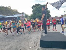 HUT Lantas Ke 69, Peserta Lomba Lari Bawah Beras 5 Kilogram Star di Polres Majene Finis di Panti Asuhan Al-Ma’wa Simullu